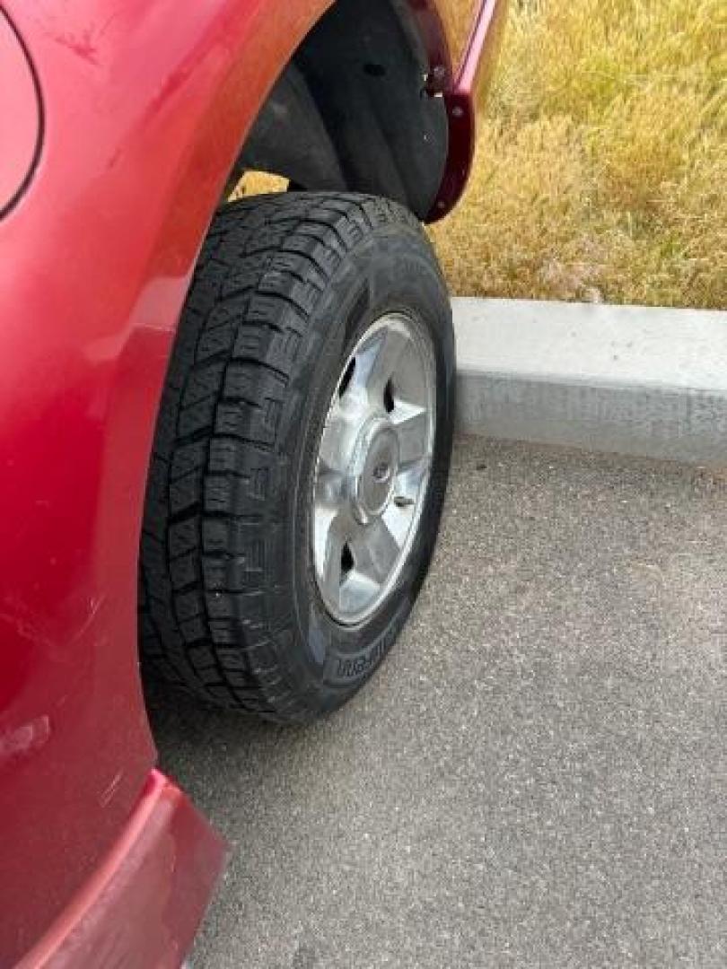 2004 Red Fire Metallic /Medium Dark Flint Cloth Interior Ford Explorer Sport Trac XLT 2WD (1FMZU67K24U) with an 4.0L V6 SOHC 12V FFV engine, 5-Speed Automatic transmission, located at 1865 East Red Hills Pkwy, St. George, 84770, (435) 628-0023, 37.120850, -113.543640 - This vehicle is a Mechanic Special. This means it will need some love. Runs a drives fine but has body damage, leaks or other mechanical issues. It did NOT pass our 50 point inspection. Get a great deal on a less than perfect car. These cars do NOT qualify for our in house financing. Cash and carry, - Photo#8