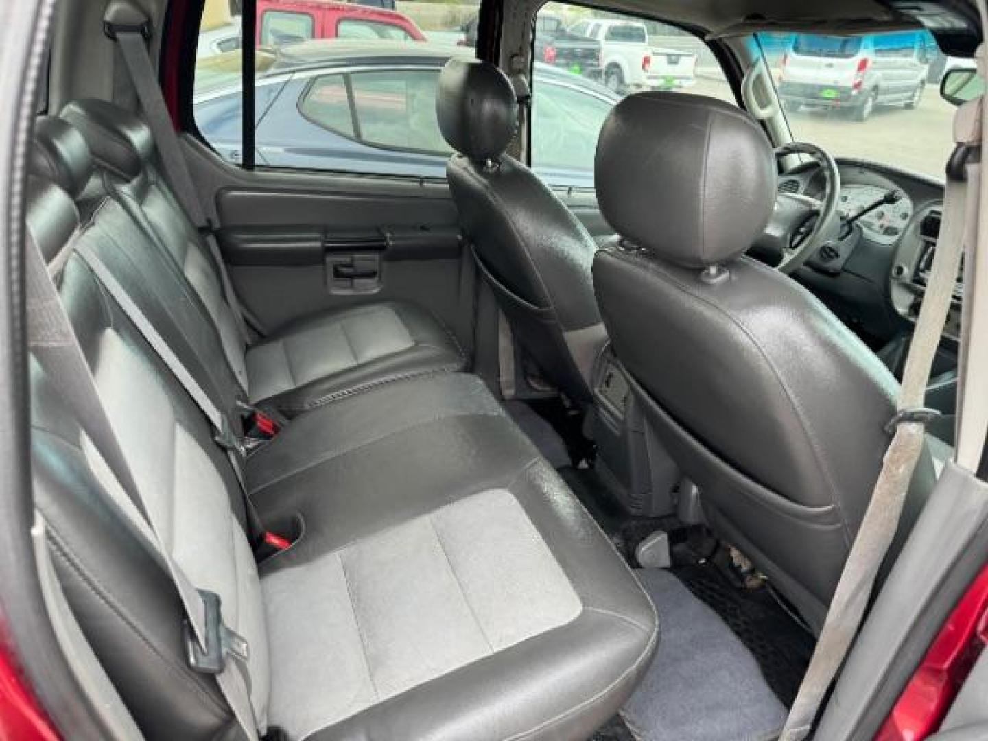 2004 Red Fire Metallic /Medium Dark Flint Cloth Interior Ford Explorer Sport Trac XLT 2WD (1FMZU67K24U) with an 4.0L V6 SOHC 12V FFV engine, 5-Speed Automatic transmission, located at 1865 East Red Hills Pkwy, St. George, 84770, (435) 628-0023, 37.120850, -113.543640 - This vehicle is a Mechanic Special. This means it will need some love. Runs a drives fine but has body damage, leaks or other mechanical issues. It did NOT pass our 50 point inspection. Get a great deal on a less than perfect car. These cars do NOT qualify for our in house financing. Cash and carry, - Photo#11