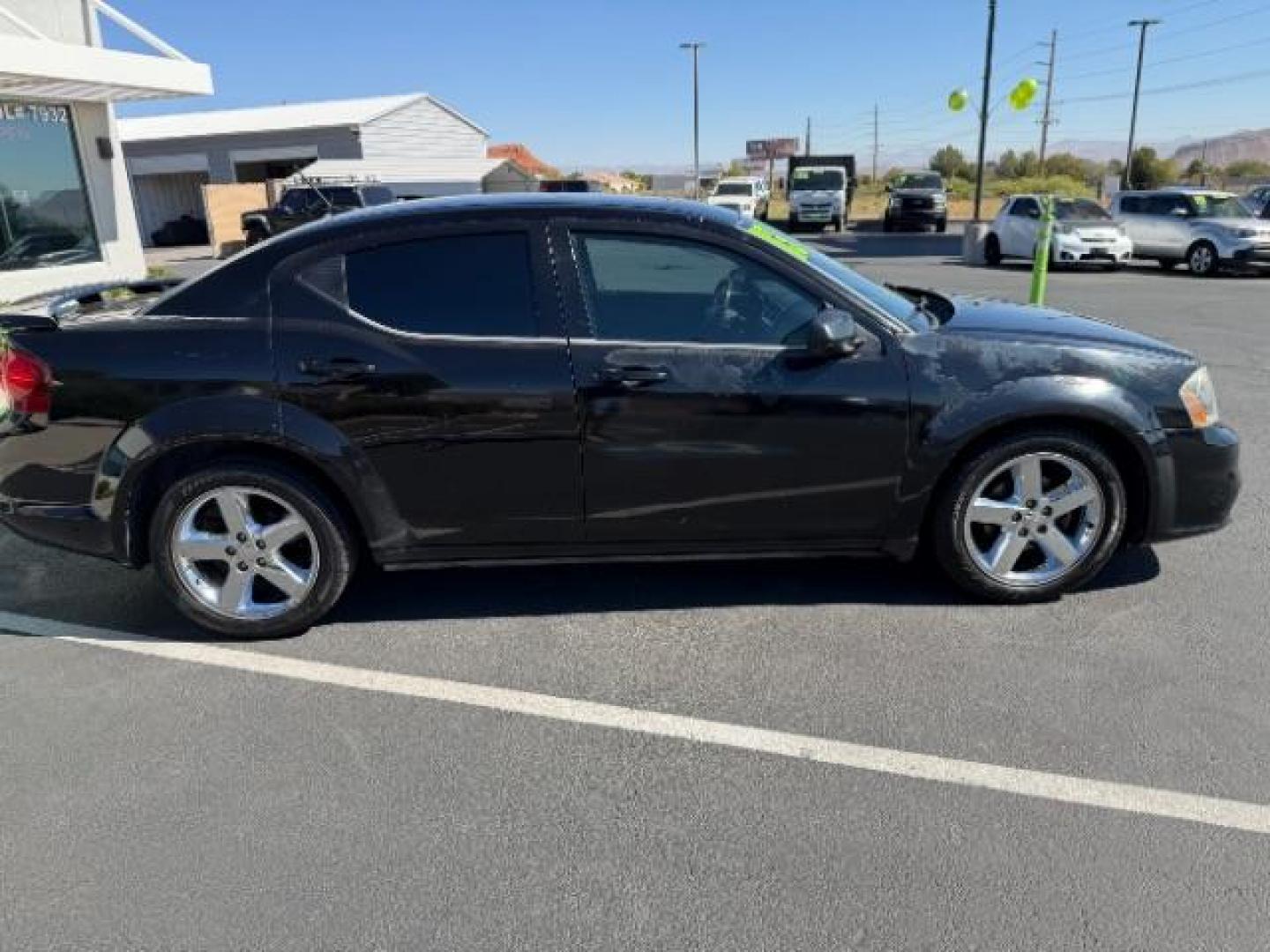 2013 Black /Black Cloth Interior Dodge Avenger SXT (1C3CDZCG1DN) with an 3.6L V6 DOHC 24V FFV engine, 6-Speed Automatic transmission, located at 1865 East Red Hills Pkwy, St. George, 84770, (435) 628-0023, 37.120850, -113.543640 - We specialize in helping ALL people get the best financing available. No matter your credit score, good, bad or none we can get you an amazing rate. Had a bankruptcy, divorce, or repossessions? We give you the green light to get your credit back on the road. Low down and affordable payments that fit - Photo#7