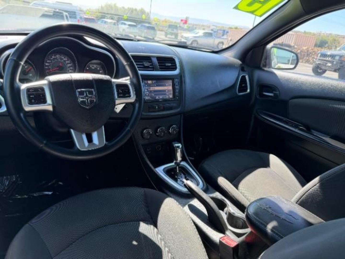 2013 Black /Black Cloth Interior Dodge Avenger SXT (1C3CDZCG1DN) with an 3.6L V6 DOHC 24V FFV engine, 6-Speed Automatic transmission, located at 1865 East Red Hills Pkwy, St. George, 84770, (435) 628-0023, 37.120850, -113.543640 - We specialize in helping ALL people get the best financing available. No matter your credit score, good, bad or none we can get you an amazing rate. Had a bankruptcy, divorce, or repossessions? We give you the green light to get your credit back on the road. Low down and affordable payments that fit - Photo#14