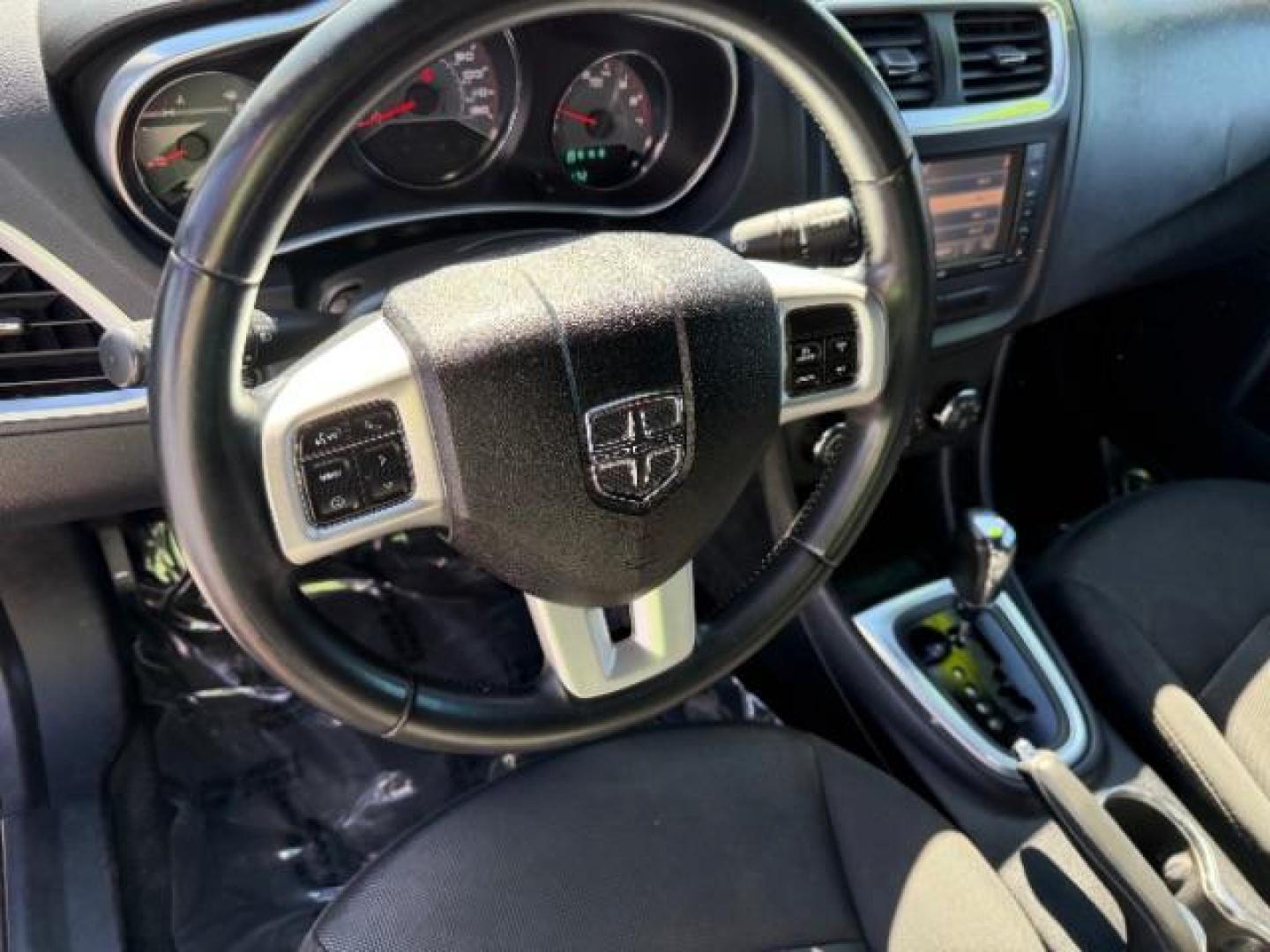 2013 Black /Black Cloth Interior Dodge Avenger SXT (1C3CDZCG1DN) with an 3.6L V6 DOHC 24V FFV engine, 6-Speed Automatic transmission, located at 1865 East Red Hills Pkwy, St. George, 84770, (435) 628-0023, 37.120850, -113.543640 - We specialize in helping ALL people get the best financing available. No matter your credit score, good, bad or none we can get you an amazing rate. Had a bankruptcy, divorce, or repossessions? We give you the green light to get your credit back on the road. Low down and affordable payments that fit - Photo#17