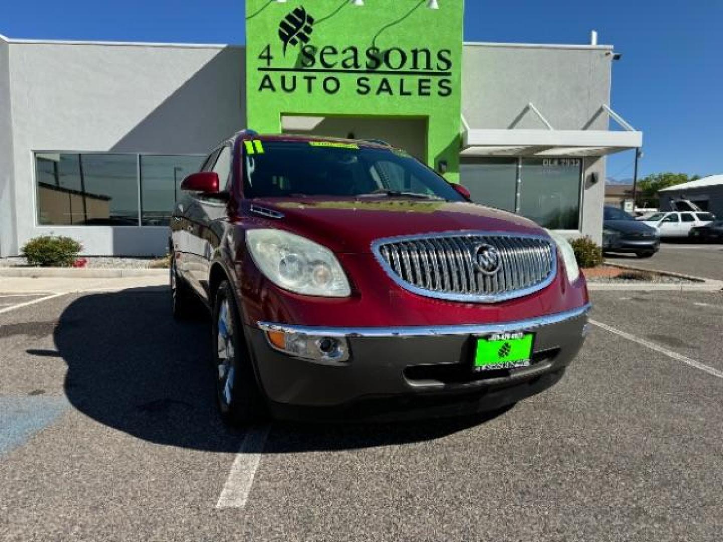 2011 Red Jewel Tintcoat /Ebony Leather Interi Buick Enclave CXL-2 FWD (5GAKRCED3BJ) with an 3.6L V6 DOHC 24V engine, 6-Speed Automatic Ov transmission, located at 940 North Main Street, Cedar City, UT, 84720, (435) 628-0023, 37.692936, -113.061897 - Photo#0