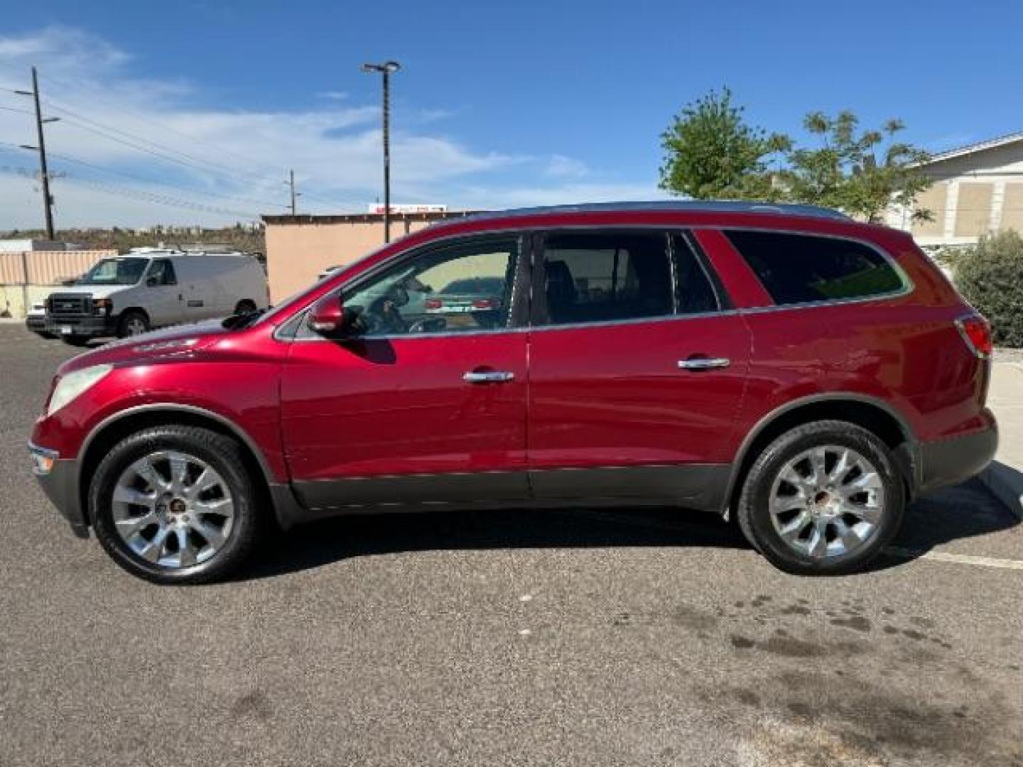 2011 Red Jewel Tintcoat /Ebony Leather Interi Buick Enclave CXL-2 FWD (5GAKRCED3BJ) with an 3.6L V6 DOHC 24V engine, 6-Speed Automatic Ov transmission, located at 940 North Main Street, Cedar City, UT, 84720, (435) 628-0023, 37.692936, -113.061897 - Photo#3