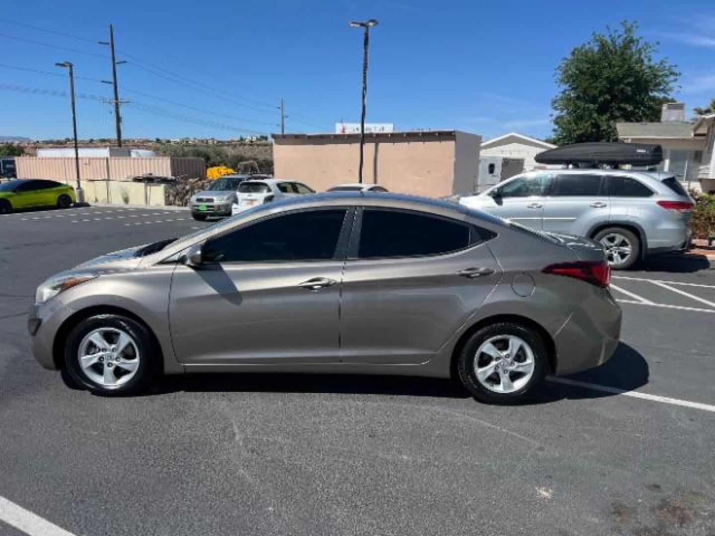 2014 Beige /Beige Hyundai Elantra GLS A/T (5NPDH4AE3EH) with an 1.8L L4 DOHC 16V engine, 6-Speed Automatic transmission, located at 940 North Main Street, Cedar City, UT, 84720, (435) 628-0023, 37.692936, -113.061897 - We specialize in helping ALL people get the best financing available. No matter your credit score, good, bad or none we can get you an amazing rate. Had a bankruptcy, divorce, or repossessions? We give you the green light to get your credit back on the road. Low down and affordable payments that fit - Photo#3