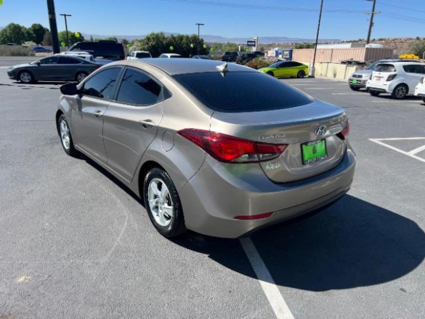 2014 Beige /Beige Hyundai Elantra GLS A/T (5NPDH4AE3EH) with an 1.8L L4 DOHC 16V engine, 6-Speed Automatic transmission, located at 940 North Main Street, Cedar City, UT, 84720, (435) 628-0023, 37.692936, -113.061897 - We specialize in helping ALL people get the best financing available. No matter your credit score, good, bad or none we can get you an amazing rate. Had a bankruptcy, divorce, or repossessions? We give you the green light to get your credit back on the road. Low down and affordable payments that fit - Photo#4
