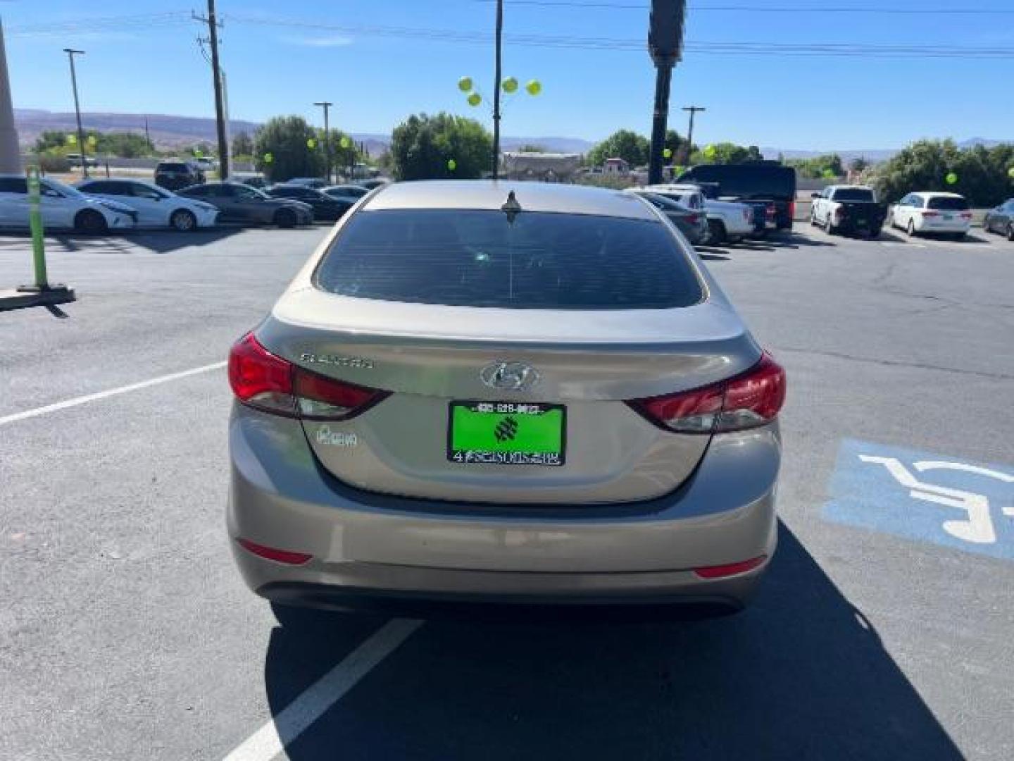 2014 Beige /Beige Hyundai Elantra GLS A/T (5NPDH4AE3EH) with an 1.8L L4 DOHC 16V engine, 6-Speed Automatic transmission, located at 940 North Main Street, Cedar City, UT, 84720, (435) 628-0023, 37.692936, -113.061897 - We specialize in helping ALL people get the best financing available. No matter your credit score, good, bad or none we can get you an amazing rate. Had a bankruptcy, divorce, or repossessions? We give you the green light to get your credit back on the road. Low down and affordable payments that fit - Photo#5