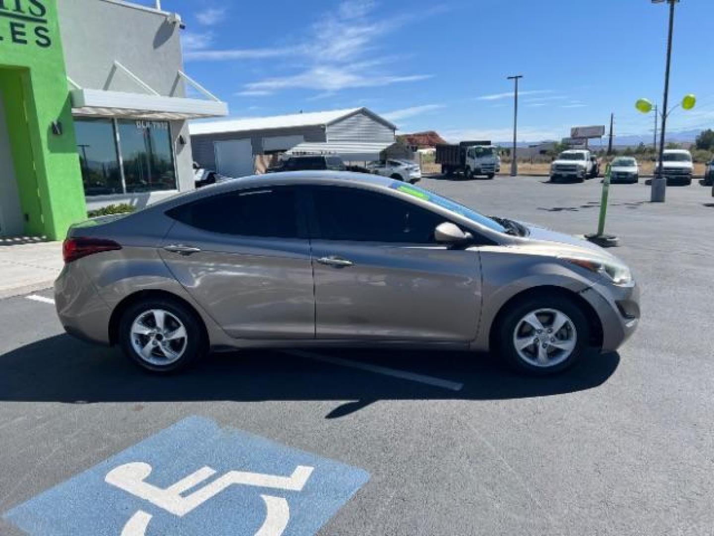 2014 Beige /Beige Hyundai Elantra GLS A/T (5NPDH4AE3EH) with an 1.8L L4 DOHC 16V engine, 6-Speed Automatic transmission, located at 940 North Main Street, Cedar City, UT, 84720, (435) 628-0023, 37.692936, -113.061897 - We specialize in helping ALL people get the best financing available. No matter your credit score, good, bad or none we can get you an amazing rate. Had a bankruptcy, divorce, or repossessions? We give you the green light to get your credit back on the road. Low down and affordable payments that fit - Photo#7