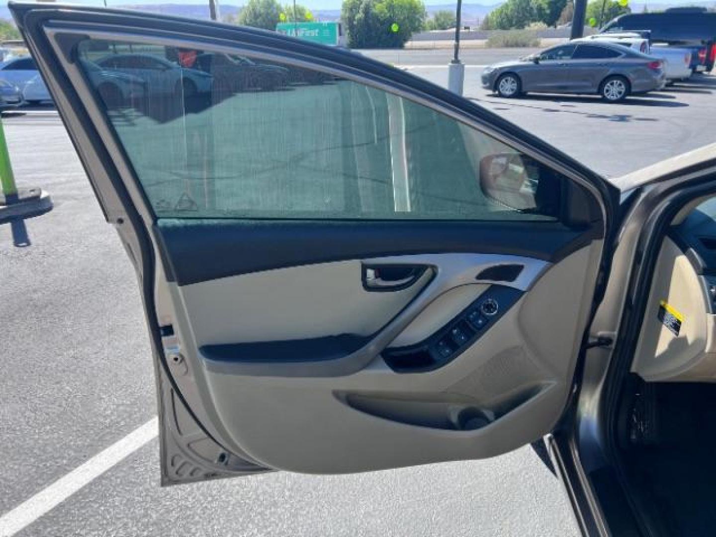2014 Beige /Beige Hyundai Elantra GLS A/T (5NPDH4AE3EH) with an 1.8L L4 DOHC 16V engine, 6-Speed Automatic transmission, located at 940 North Main Street, Cedar City, UT, 84720, (435) 628-0023, 37.692936, -113.061897 - We specialize in helping ALL people get the best financing available. No matter your credit score, good, bad or none we can get you an amazing rate. Had a bankruptcy, divorce, or repossessions? We give you the green light to get your credit back on the road. Low down and affordable payments that fit - Photo#12