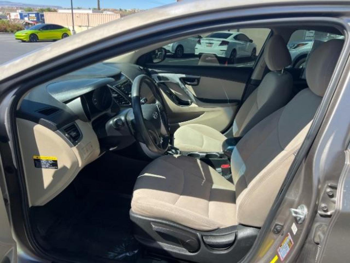 2014 Beige /Beige Hyundai Elantra GLS A/T (5NPDH4AE3EH) with an 1.8L L4 DOHC 16V engine, 6-Speed Automatic transmission, located at 940 North Main Street, Cedar City, UT, 84720, (435) 628-0023, 37.692936, -113.061897 - We specialize in helping ALL people get the best financing available. No matter your credit score, good, bad or none we can get you an amazing rate. Had a bankruptcy, divorce, or repossessions? We give you the green light to get your credit back on the road. Low down and affordable payments that fit - Photo#14