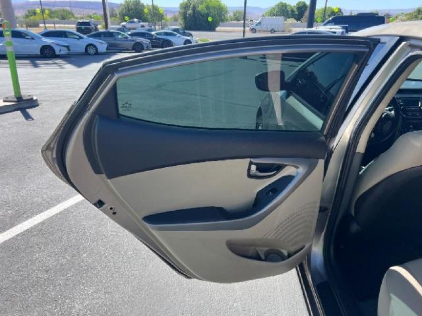 2014 Beige /Beige Hyundai Elantra GLS A/T (5NPDH4AE3EH) with an 1.8L L4 DOHC 16V engine, 6-Speed Automatic transmission, located at 940 North Main Street, Cedar City, UT, 84720, (435) 628-0023, 37.692936, -113.061897 - We specialize in helping ALL people get the best financing available. No matter your credit score, good, bad or none we can get you an amazing rate. Had a bankruptcy, divorce, or repossessions? We give you the green light to get your credit back on the road. Low down and affordable payments that fit - Photo#20