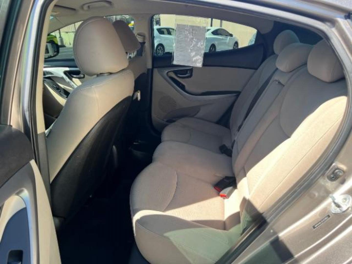 2014 Beige /Beige Hyundai Elantra GLS A/T (5NPDH4AE3EH) with an 1.8L L4 DOHC 16V engine, 6-Speed Automatic transmission, located at 940 North Main Street, Cedar City, UT, 84720, (435) 628-0023, 37.692936, -113.061897 - We specialize in helping ALL people get the best financing available. No matter your credit score, good, bad or none we can get you an amazing rate. Had a bankruptcy, divorce, or repossessions? We give you the green light to get your credit back on the road. Low down and affordable payments that fit - Photo#21