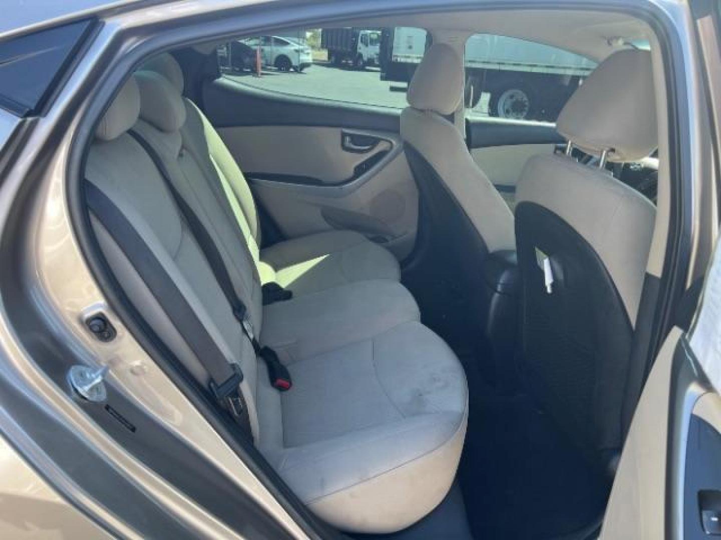 2014 Beige /Beige Hyundai Elantra GLS A/T (5NPDH4AE3EH) with an 1.8L L4 DOHC 16V engine, 6-Speed Automatic transmission, located at 940 North Main Street, Cedar City, UT, 84720, (435) 628-0023, 37.692936, -113.061897 - We specialize in helping ALL people get the best financing available. No matter your credit score, good, bad or none we can get you an amazing rate. Had a bankruptcy, divorce, or repossessions? We give you the green light to get your credit back on the road. Low down and affordable payments that fit - Photo#27