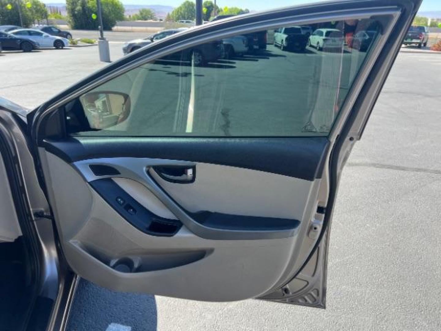 2014 Beige /Beige Hyundai Elantra GLS A/T (5NPDH4AE3EH) with an 1.8L L4 DOHC 16V engine, 6-Speed Automatic transmission, located at 940 North Main Street, Cedar City, UT, 84720, (435) 628-0023, 37.692936, -113.061897 - We specialize in helping ALL people get the best financing available. No matter your credit score, good, bad or none we can get you an amazing rate. Had a bankruptcy, divorce, or repossessions? We give you the green light to get your credit back on the road. Low down and affordable payments that fit - Photo#28