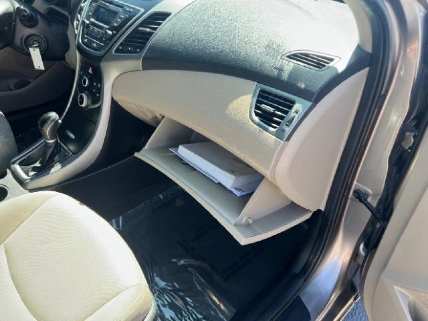 2014 Beige /Beige Hyundai Elantra GLS A/T (5NPDH4AE3EH) with an 1.8L L4 DOHC 16V engine, 6-Speed Automatic transmission, located at 940 North Main Street, Cedar City, UT, 84720, (435) 628-0023, 37.692936, -113.061897 - We specialize in helping ALL people get the best financing available. No matter your credit score, good, bad or none we can get you an amazing rate. Had a bankruptcy, divorce, or repossessions? We give you the green light to get your credit back on the road. Low down and affordable payments that fit - Photo#30