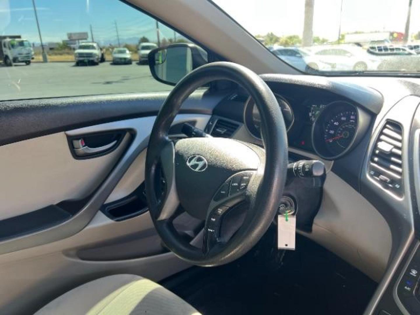 2014 Beige /Beige Hyundai Elantra GLS A/T (5NPDH4AE3EH) with an 1.8L L4 DOHC 16V engine, 6-Speed Automatic transmission, located at 940 North Main Street, Cedar City, UT, 84720, (435) 628-0023, 37.692936, -113.061897 - We specialize in helping ALL people get the best financing available. No matter your credit score, good, bad or none we can get you an amazing rate. Had a bankruptcy, divorce, or repossessions? We give you the green light to get your credit back on the road. Low down and affordable payments that fit - Photo#31