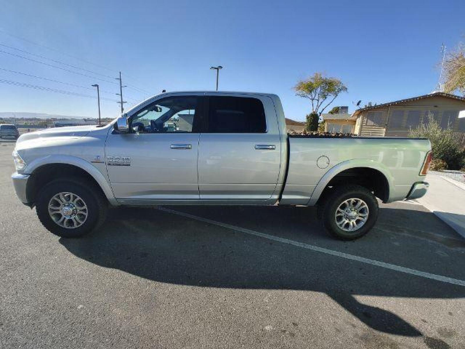 2017 Bright Silver Metallic Clear Coat /Black, leather RAM 2500 Laramie Crew Cab SWB 4WD (3C6UR5FL6HG) with an 6.7L L6 OHV 24V TURBO DIESEL engine, 6-Speed Automatic transmission, located at 1865 East Red Hills Pkwy, St. George, 84770, (435) 628-0023, 37.120850, -113.543640 - We specialize in helping ALL people get the best financing available. No matter your credit score, good, bad or none we can get you an amazing rate. Had a bankruptcy, divorce, or repossessions? We give you the green light to get your credit back on the road. Low down and affordable payments that fit - Photo #3