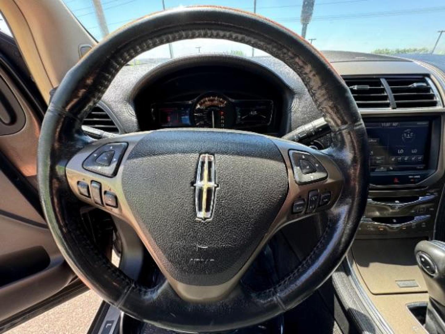 2011 Earth Metallic /Charcoal Black Leather Interior Lincoln MKX FWD (2LMDJ6JK0BB) with an 3.7L V6 DOHC 24V engine, 6-Speed Automatic transmission, located at 940 North Main Street, Cedar City, UT, 84720, (435) 628-0023, 37.692936, -113.061897 - We specialize in helping ALL people get the best financing available. No matter your credit score, good, bad or none we can get you an amazing rate. Had a bankruptcy, divorce, or repossessions? We give you the green light to get your credit back on the road. Low down and affordable payments that fit - Photo#19
