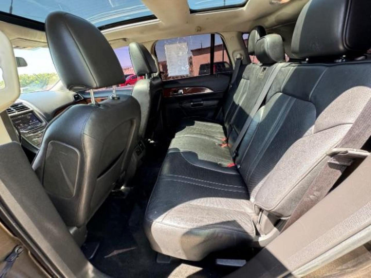 2011 Earth Metallic /Charcoal Black Leather Interior Lincoln MKX FWD (2LMDJ6JK0BB) with an 3.7L V6 DOHC 24V engine, 6-Speed Automatic transmission, located at 940 North Main Street, Cedar City, UT, 84720, (435) 628-0023, 37.692936, -113.061897 - We specialize in helping ALL people get the best financing available. No matter your credit score, good, bad or none we can get you an amazing rate. Had a bankruptcy, divorce, or repossessions? We give you the green light to get your credit back on the road. Low down and affordable payments that fit - Photo#25