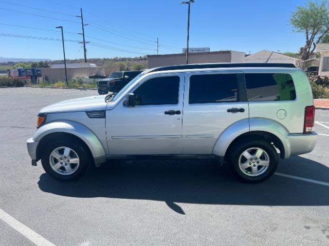 2008 Bright Silver Metallic /Dark Khaki Cloth Seats Dodge Nitro SXT 4WD (1D8GU28K28W) with an 3.7L V6 SOHC 12V engine, 4-Speed Automatic transmission, located at 940 North Main Street, Cedar City, UT, 84720, (435) 628-0023, 37.692936, -113.061897 - 2008 Dodge Nitro SXT 4WD - Rugged Power at an Unbeatable Price! Built tough and loaded with features, this Bright Silver Metallic Dodge Nitro SXT 4WD is ready for whatever the road throws at you. Whether you are tackling back roads or handling daily commutes, this capable SUV delivers serious capab - Photo#3