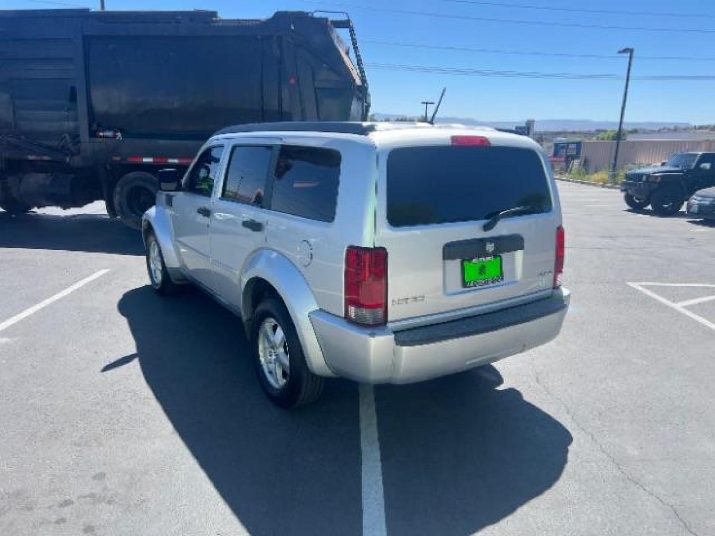 2008 Bright Silver Metallic /Dark Khaki Cloth Seats Dodge Nitro SXT 4WD (1D8GU28K28W) with an 3.7L V6 SOHC 12V engine, 4-Speed Automatic transmission, located at 1865 East Red Hills Pkwy, St. George, 84770, (435) 628-0023, 37.120850, -113.543640 - 2008 Dodge Nitro SXT 4WD - Rugged Power at an Unbeatable Price! Built tough and loaded with features, this Bright Silver Metallic Dodge Nitro SXT 4WD is ready for whatever the road throws at you. Whether you are tackling back roads or handling daily commutes, this capable SUV delivers serious capab- Photo#4