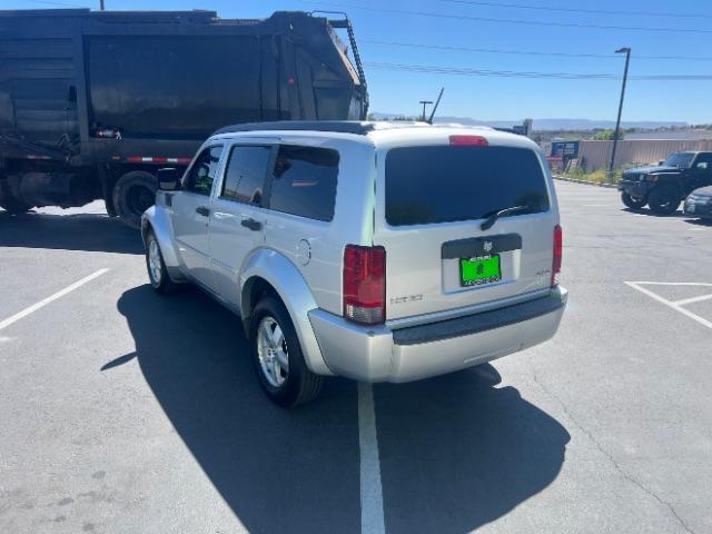 2008 Bright Silver Metallic /Dark Khaki Cloth Seats Dodge Nitro SXT 4WD (1D8GU28K28W) with an 3.7L V6 SOHC 12V engine, 4-Speed Automatic transmission, located at 940 North Main Street, Cedar City, UT, 84720, (435) 628-0023, 37.692936, -113.061897 - 2008 Dodge Nitro SXT 4WD - Rugged Power at an Unbeatable Price! Built tough and loaded with features, this Bright Silver Metallic Dodge Nitro SXT 4WD is ready for whatever the road throws at you. Whether you are tackling back roads or handling daily commutes, this capable SUV delivers serious capab - Photo#4