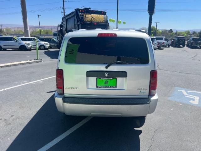 2008 Bright Silver Metallic /Dark Khaki Cloth Seats Dodge Nitro SXT 4WD (1D8GU28K28W) with an 3.7L V6 SOHC 12V engine, 4-Speed Automatic transmission, located at 940 North Main Street, Cedar City, UT, 84720, (435) 628-0023, 37.692936, -113.061897 - 2008 Dodge Nitro SXT 4WD - Rugged Power at an Unbeatable Price! Built tough and loaded with features, this Bright Silver Metallic Dodge Nitro SXT 4WD is ready for whatever the road throws at you. Whether you are tackling back roads or handling daily commutes, this capable SUV delivers serious capab - Photo#5