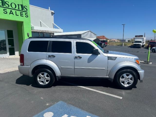 2008 Bright Silver Metallic /Dark Khaki Cloth Seats Dodge Nitro SXT 4WD (1D8GU28K28W) with an 3.7L V6 SOHC 12V engine, 4-Speed Automatic transmission, located at 940 North Main Street, Cedar City, UT, 84720, (435) 628-0023, 37.692936, -113.061897 - 2008 Dodge Nitro SXT 4WD - Rugged Power at an Unbeatable Price! Built tough and loaded with features, this Bright Silver Metallic Dodge Nitro SXT 4WD is ready for whatever the road throws at you. Whether you are tackling back roads or handling daily commutes, this capable SUV delivers serious capab - Photo#7