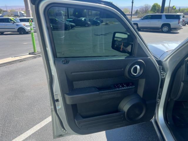 2008 Bright Silver Metallic /Dark Khaki Cloth Seats Dodge Nitro SXT 4WD (1D8GU28K28W) with an 3.7L V6 SOHC 12V engine, 4-Speed Automatic transmission, located at 940 North Main Street, Cedar City, UT, 84720, (435) 628-0023, 37.692936, -113.061897 - 2008 Dodge Nitro SXT 4WD - Rugged Power at an Unbeatable Price! Built tough and loaded with features, this Bright Silver Metallic Dodge Nitro SXT 4WD is ready for whatever the road throws at you. Whether you are tackling back roads or handling daily commutes, this capable SUV delivers serious capab - Photo#12