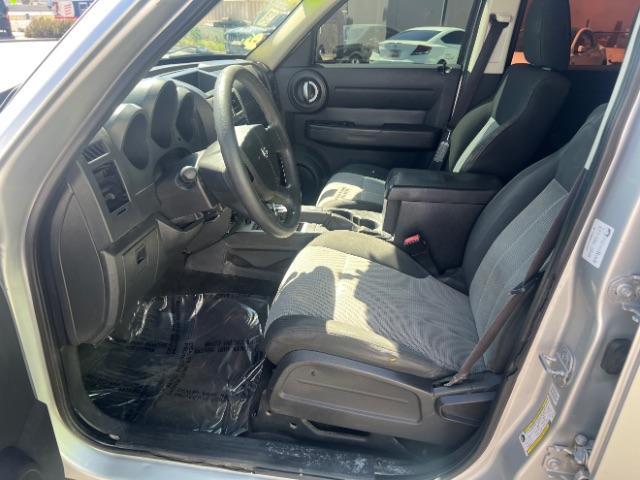 2008 Bright Silver Metallic /Dark Khaki Cloth Seats Dodge Nitro SXT 4WD (1D8GU28K28W) with an 3.7L V6 SOHC 12V engine, 4-Speed Automatic transmission, located at 940 North Main Street, Cedar City, UT, 84720, (435) 628-0023, 37.692936, -113.061897 - 2008 Dodge Nitro SXT 4WD - Rugged Power at an Unbeatable Price! Built tough and loaded with features, this Bright Silver Metallic Dodge Nitro SXT 4WD is ready for whatever the road throws at you. Whether you are tackling back roads or handling daily commutes, this capable SUV delivers serious capab - Photo#14