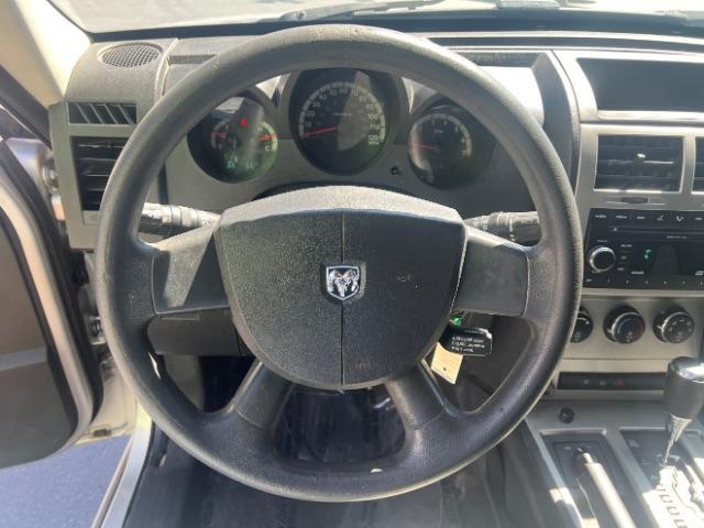 2008 Bright Silver Metallic /Dark Khaki Cloth Seats Dodge Nitro SXT 4WD (1D8GU28K28W) with an 3.7L V6 SOHC 12V engine, 4-Speed Automatic transmission, located at 940 North Main Street, Cedar City, UT, 84720, (435) 628-0023, 37.692936, -113.061897 - 2008 Dodge Nitro SXT 4WD - Rugged Power at an Unbeatable Price! Built tough and loaded with features, this Bright Silver Metallic Dodge Nitro SXT 4WD is ready for whatever the road throws at you. Whether you are tackling back roads or handling daily commutes, this capable SUV delivers serious capab - Photo#15