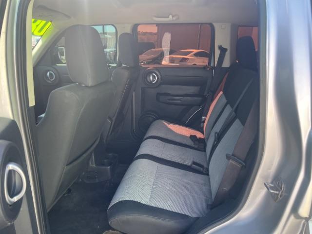 2008 Bright Silver Metallic /Dark Khaki Cloth Seats Dodge Nitro SXT 4WD (1D8GU28K28W) with an 3.7L V6 SOHC 12V engine, 4-Speed Automatic transmission, located at 940 North Main Street, Cedar City, UT, 84720, (435) 628-0023, 37.692936, -113.061897 - 2008 Dodge Nitro SXT 4WD - Rugged Power at an Unbeatable Price! Built tough and loaded with features, this Bright Silver Metallic Dodge Nitro SXT 4WD is ready for whatever the road throws at you. Whether you are tackling back roads or handling daily commutes, this capable SUV delivers serious capab - Photo#21