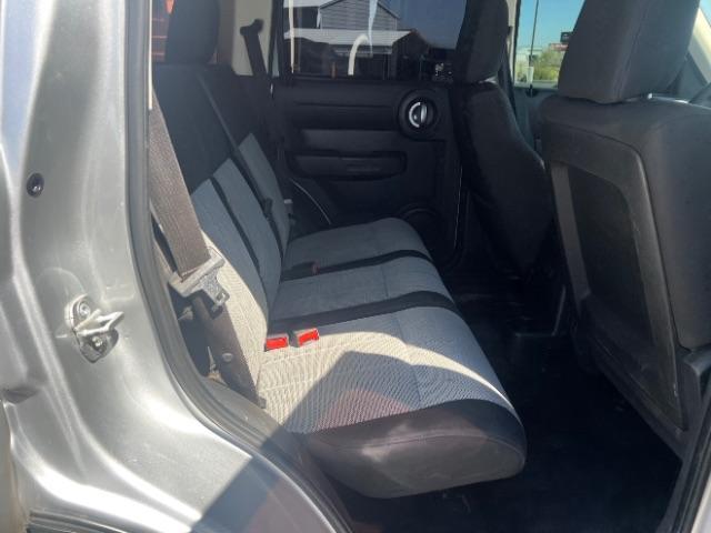 2008 Bright Silver Metallic /Dark Khaki Cloth Seats Dodge Nitro SXT 4WD (1D8GU28K28W) with an 3.7L V6 SOHC 12V engine, 4-Speed Automatic transmission, located at 940 North Main Street, Cedar City, UT, 84720, (435) 628-0023, 37.692936, -113.061897 - 2008 Dodge Nitro SXT 4WD - Rugged Power at an Unbeatable Price! Built tough and loaded with features, this Bright Silver Metallic Dodge Nitro SXT 4WD is ready for whatever the road throws at you. Whether you are tackling back roads or handling daily commutes, this capable SUV delivers serious capab - Photo#25