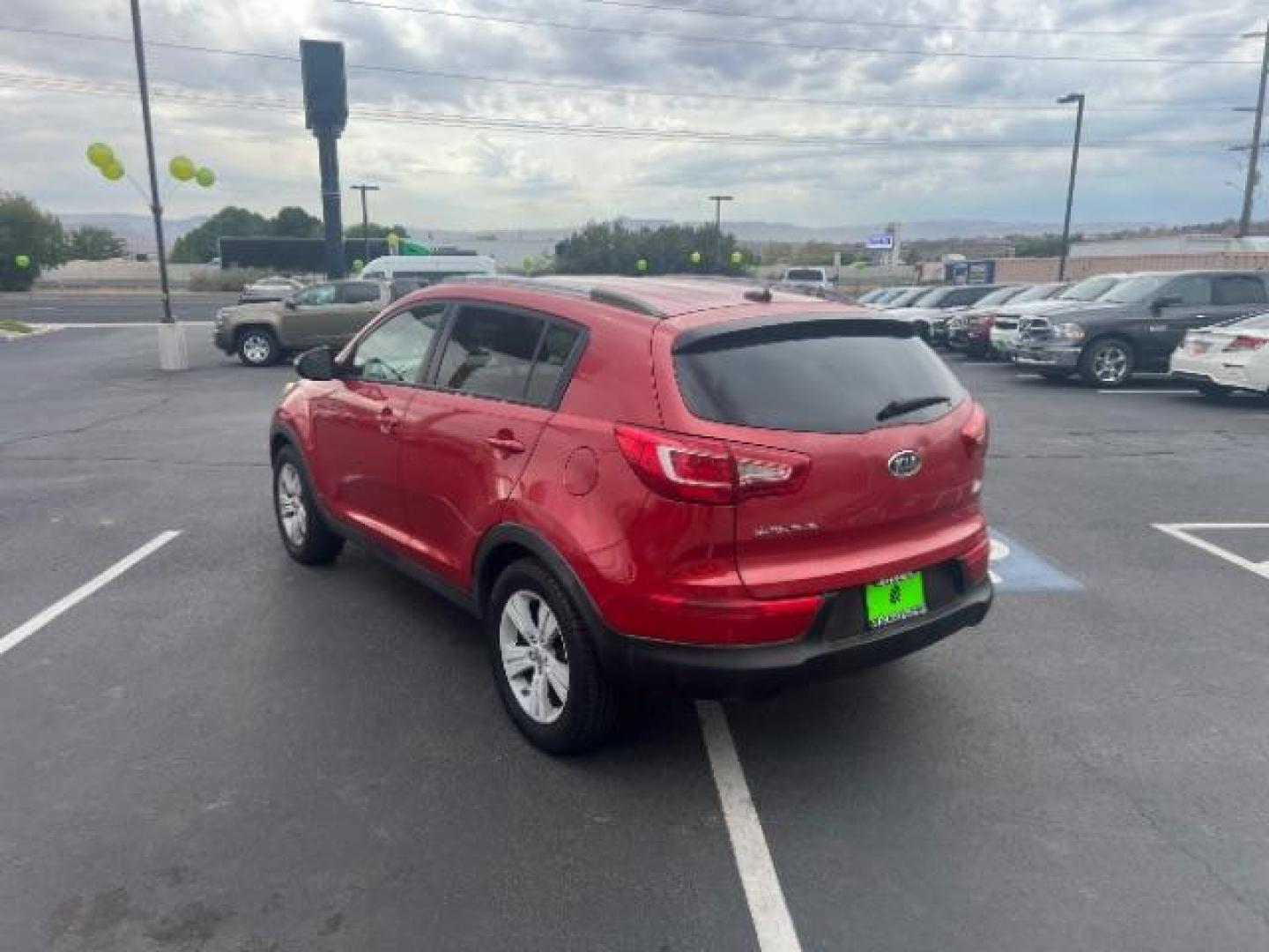 2011 Signal Red Metallic /Alpine Gray Cloth In Kia Sportage LX FWD (KNDPB3A27B7) with an 2.4L V6 DOHC 24V engine, 6-Speed Automatic transmission, located at 940 North Main Street, Cedar City, UT, 84720, (435) 628-0023, 37.692936, -113.061897 - We specialize in helping ALL people get the best financing available. No matter your credit score, good, bad or none we can get you an amazing rate. Had a bankruptcy, divorce, or repossessions? We give you the green light to get your credit back on the road. Low down and affordable payments that fit - Photo#4