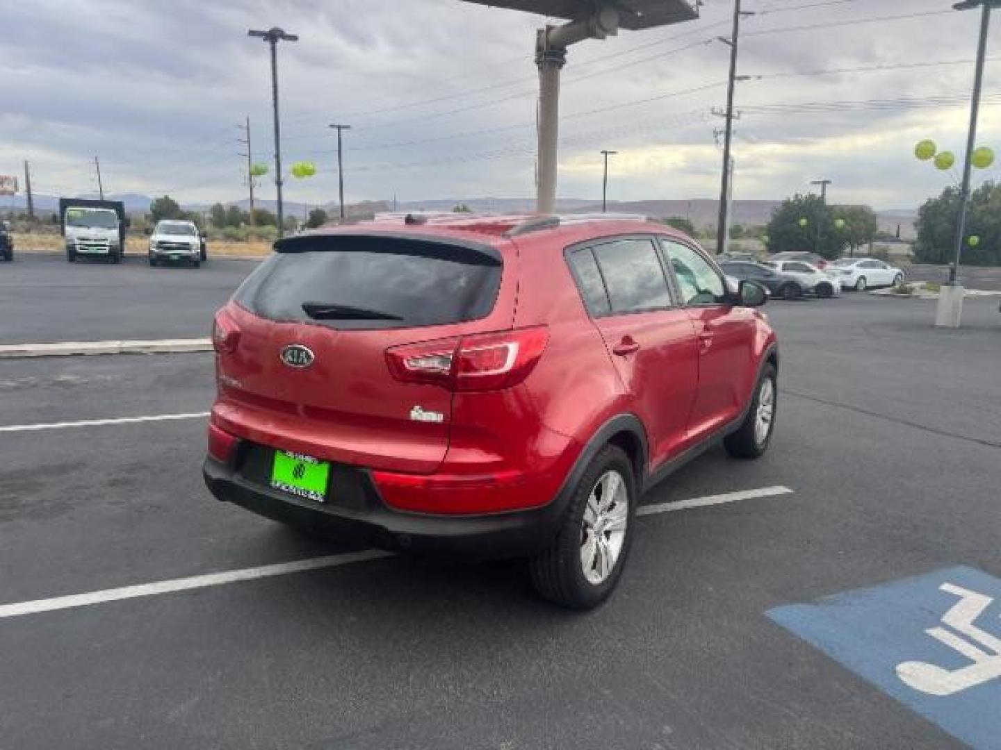 2011 Signal Red Metallic /Alpine Gray Cloth In Kia Sportage LX FWD (KNDPB3A27B7) with an 2.4L V6 DOHC 24V engine, 6-Speed Automatic transmission, located at 940 North Main Street, Cedar City, UT, 84720, (435) 628-0023, 37.692936, -113.061897 - We specialize in helping ALL people get the best financing available. No matter your credit score, good, bad or none we can get you an amazing rate. Had a bankruptcy, divorce, or repossessions? We give you the green light to get your credit back on the road. Low down and affordable payments that fit - Photo#6