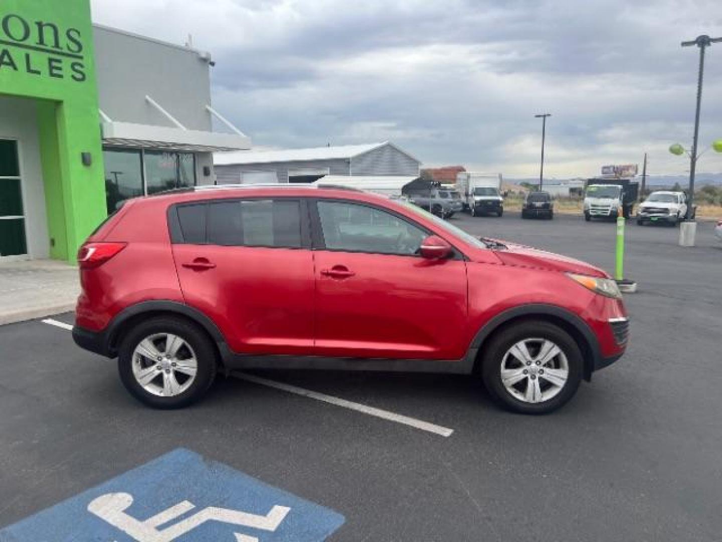 2011 Signal Red Metallic /Alpine Gray Cloth In Kia Sportage LX FWD (KNDPB3A27B7) with an 2.4L V6 DOHC 24V engine, 6-Speed Automatic transmission, located at 940 North Main Street, Cedar City, UT, 84720, (435) 628-0023, 37.692936, -113.061897 - We specialize in helping ALL people get the best financing available. No matter your credit score, good, bad or none we can get you an amazing rate. Had a bankruptcy, divorce, or repossessions? We give you the green light to get your credit back on the road. Low down and affordable payments that fit - Photo#7