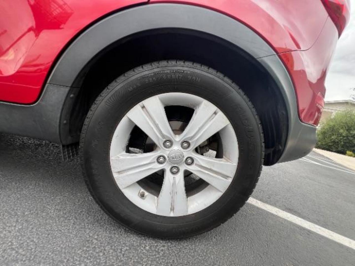 2011 Signal Red Metallic /Alpine Gray Cloth In Kia Sportage LX FWD (KNDPB3A27B7) with an 2.4L V6 DOHC 24V engine, 6-Speed Automatic transmission, located at 940 North Main Street, Cedar City, UT, 84720, (435) 628-0023, 37.692936, -113.061897 - We specialize in helping ALL people get the best financing available. No matter your credit score, good, bad or none we can get you an amazing rate. Had a bankruptcy, divorce, or repossessions? We give you the green light to get your credit back on the road. Low down and affordable payments that fit - Photo#11