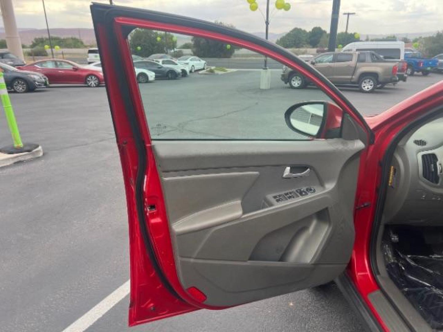2011 Signal Red Metallic /Alpine Gray Cloth In Kia Sportage LX FWD (KNDPB3A27B7) with an 2.4L V6 DOHC 24V engine, 6-Speed Automatic transmission, located at 940 North Main Street, Cedar City, UT, 84720, (435) 628-0023, 37.692936, -113.061897 - We specialize in helping ALL people get the best financing available. No matter your credit score, good, bad or none we can get you an amazing rate. Had a bankruptcy, divorce, or repossessions? We give you the green light to get your credit back on the road. Low down and affordable payments that fit - Photo#12