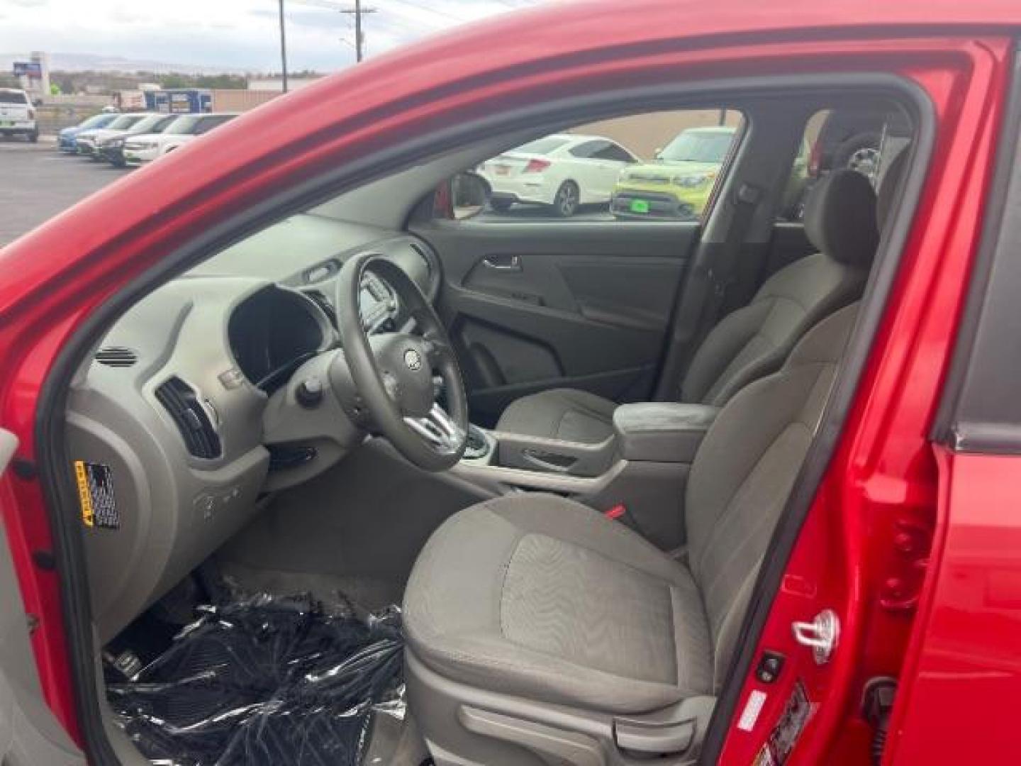 2011 Signal Red Metallic /Alpine Gray Cloth In Kia Sportage LX FWD (KNDPB3A27B7) with an 2.4L V6 DOHC 24V engine, 6-Speed Automatic transmission, located at 940 North Main Street, Cedar City, UT, 84720, (435) 628-0023, 37.692936, -113.061897 - We specialize in helping ALL people get the best financing available. No matter your credit score, good, bad or none we can get you an amazing rate. Had a bankruptcy, divorce, or repossessions? We give you the green light to get your credit back on the road. Low down and affordable payments that fit - Photo#14