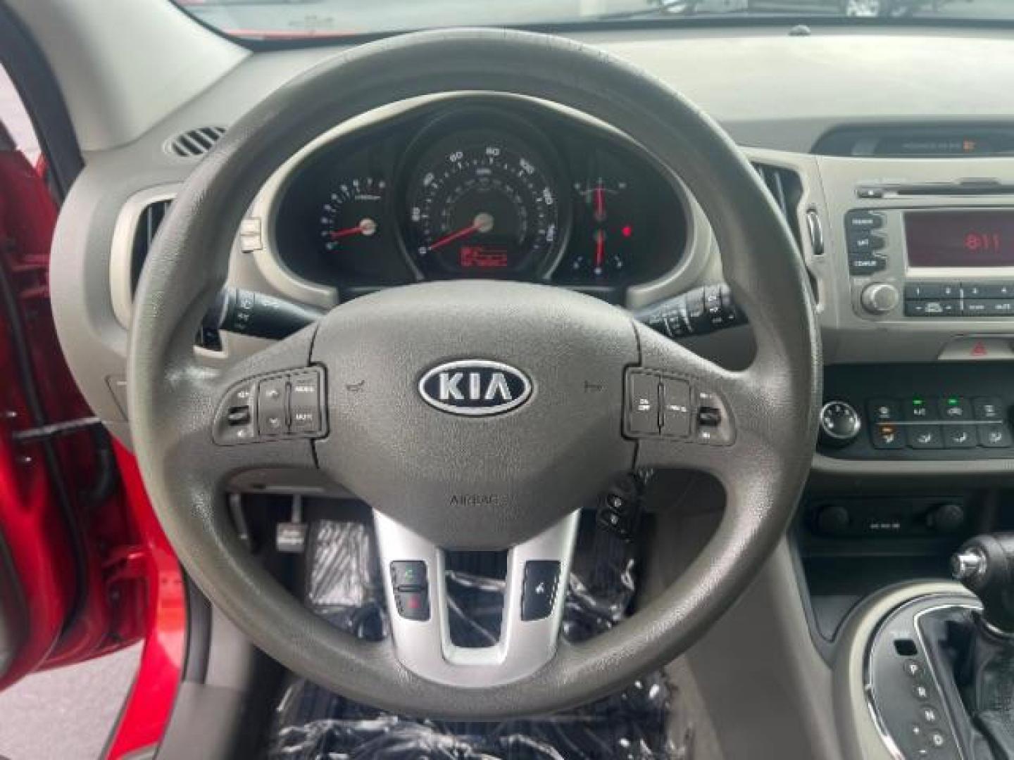 2011 Signal Red Metallic /Alpine Gray Cloth In Kia Sportage LX FWD (KNDPB3A27B7) with an 2.4L V6 DOHC 24V engine, 6-Speed Automatic transmission, located at 940 North Main Street, Cedar City, UT, 84720, (435) 628-0023, 37.692936, -113.061897 - We specialize in helping ALL people get the best financing available. No matter your credit score, good, bad or none we can get you an amazing rate. Had a bankruptcy, divorce, or repossessions? We give you the green light to get your credit back on the road. Low down and affordable payments that fit - Photo#15