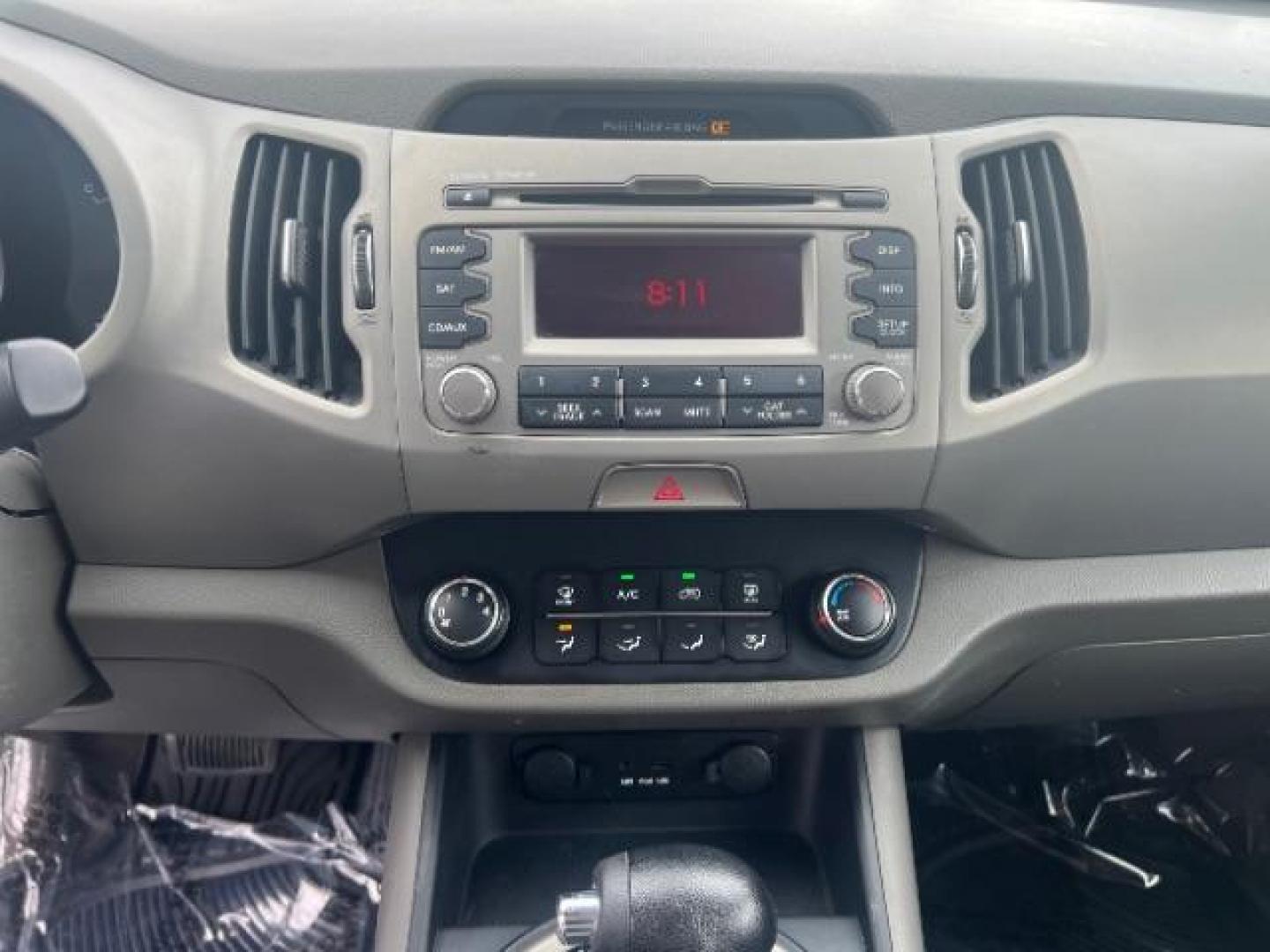 2011 Signal Red Metallic /Alpine Gray Cloth In Kia Sportage LX FWD (KNDPB3A27B7) with an 2.4L V6 DOHC 24V engine, 6-Speed Automatic transmission, located at 940 North Main Street, Cedar City, UT, 84720, (435) 628-0023, 37.692936, -113.061897 - We specialize in helping ALL people get the best financing available. No matter your credit score, good, bad or none we can get you an amazing rate. Had a bankruptcy, divorce, or repossessions? We give you the green light to get your credit back on the road. Low down and affordable payments that fit - Photo#17