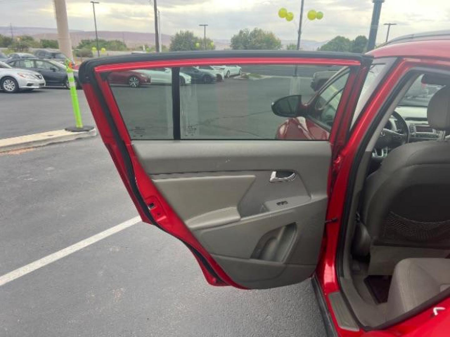 2011 Signal Red Metallic /Alpine Gray Cloth In Kia Sportage LX FWD (KNDPB3A27B7) with an 2.4L V6 DOHC 24V engine, 6-Speed Automatic transmission, located at 940 North Main Street, Cedar City, UT, 84720, (435) 628-0023, 37.692936, -113.061897 - We specialize in helping ALL people get the best financing available. No matter your credit score, good, bad or none we can get you an amazing rate. Had a bankruptcy, divorce, or repossessions? We give you the green light to get your credit back on the road. Low down and affordable payments that fit - Photo#20