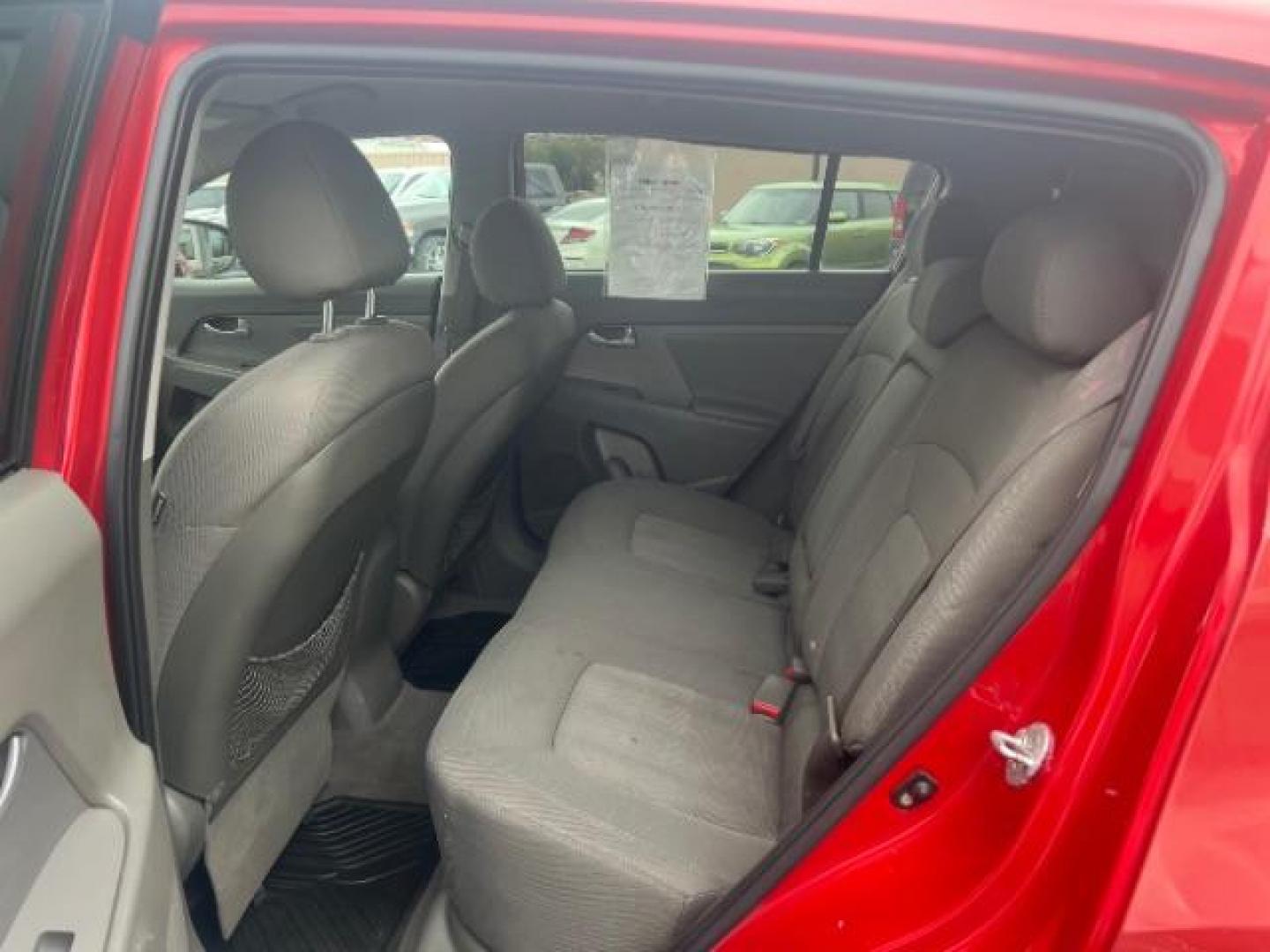 2011 Signal Red Metallic /Alpine Gray Cloth In Kia Sportage LX FWD (KNDPB3A27B7) with an 2.4L V6 DOHC 24V engine, 6-Speed Automatic transmission, located at 940 North Main Street, Cedar City, UT, 84720, (435) 628-0023, 37.692936, -113.061897 - We specialize in helping ALL people get the best financing available. No matter your credit score, good, bad or none we can get you an amazing rate. Had a bankruptcy, divorce, or repossessions? We give you the green light to get your credit back on the road. Low down and affordable payments that fit - Photo#21