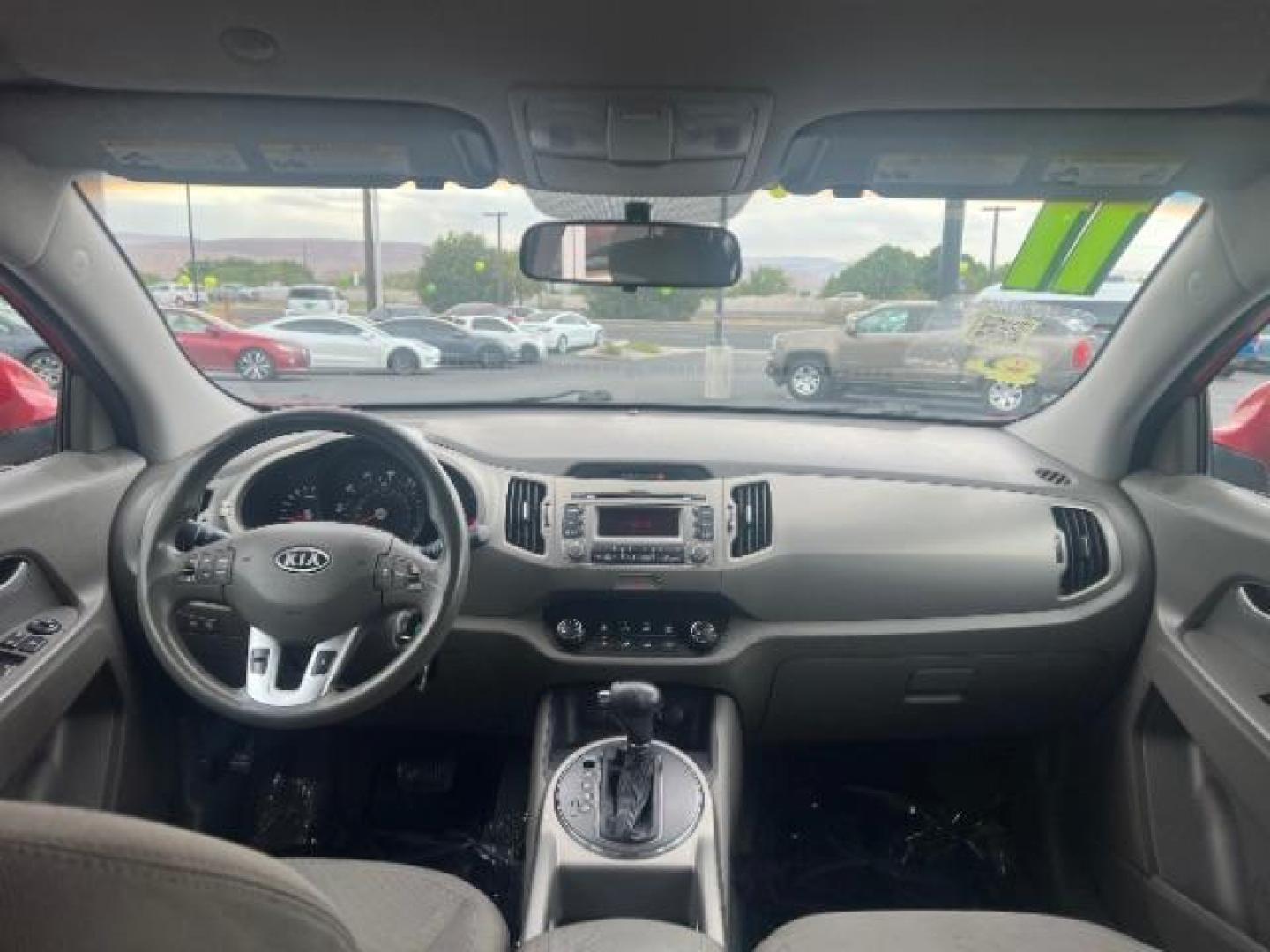 2011 Signal Red Metallic /Alpine Gray Cloth In Kia Sportage LX FWD (KNDPB3A27B7) with an 2.4L V6 DOHC 24V engine, 6-Speed Automatic transmission, located at 940 North Main Street, Cedar City, UT, 84720, (435) 628-0023, 37.692936, -113.061897 - We specialize in helping ALL people get the best financing available. No matter your credit score, good, bad or none we can get you an amazing rate. Had a bankruptcy, divorce, or repossessions? We give you the green light to get your credit back on the road. Low down and affordable payments that fit - Photo#23