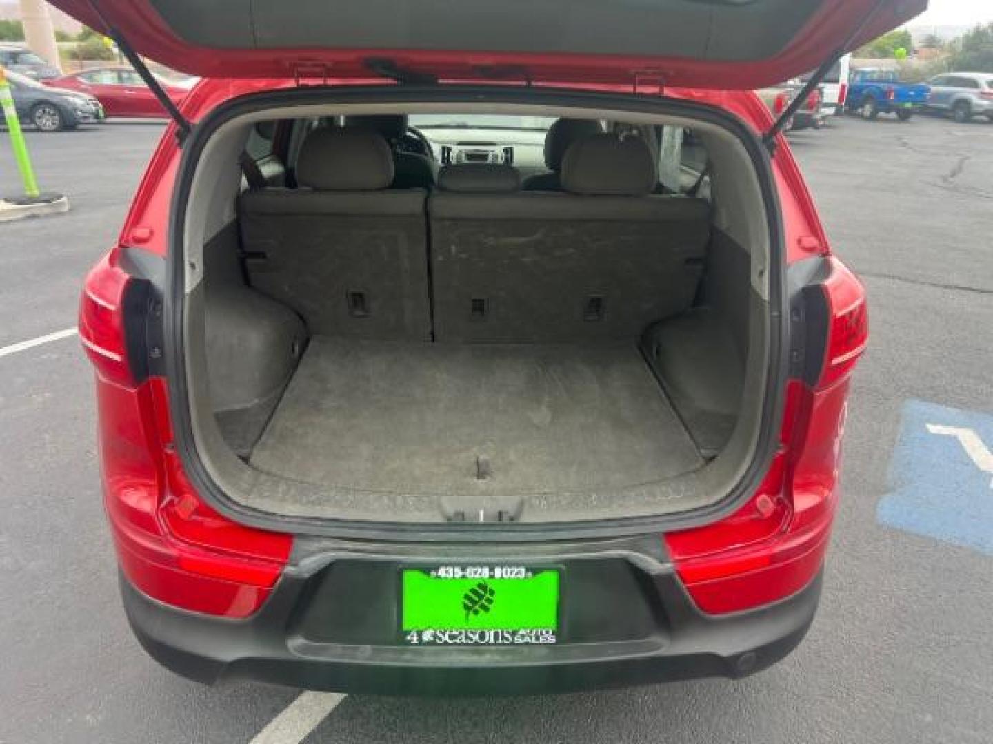 2011 Signal Red Metallic /Alpine Gray Cloth In Kia Sportage LX FWD (KNDPB3A27B7) with an 2.4L V6 DOHC 24V engine, 6-Speed Automatic transmission, located at 940 North Main Street, Cedar City, UT, 84720, (435) 628-0023, 37.692936, -113.061897 - We specialize in helping ALL people get the best financing available. No matter your credit score, good, bad or none we can get you an amazing rate. Had a bankruptcy, divorce, or repossessions? We give you the green light to get your credit back on the road. Low down and affordable payments that fit - Photo#24