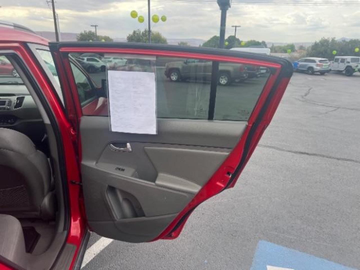 2011 Signal Red Metallic /Alpine Gray Cloth In Kia Sportage LX FWD (KNDPB3A27B7) with an 2.4L V6 DOHC 24V engine, 6-Speed Automatic transmission, located at 940 North Main Street, Cedar City, UT, 84720, (435) 628-0023, 37.692936, -113.061897 - We specialize in helping ALL people get the best financing available. No matter your credit score, good, bad or none we can get you an amazing rate. Had a bankruptcy, divorce, or repossessions? We give you the green light to get your credit back on the road. Low down and affordable payments that fit - Photo#26