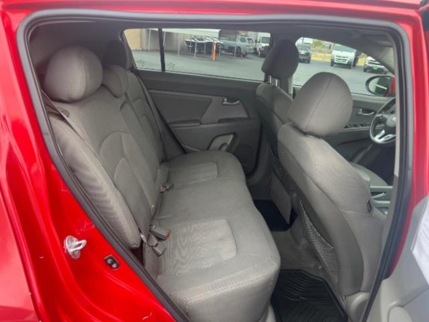 2011 Signal Red Metallic /Alpine Gray Cloth In Kia Sportage LX FWD (KNDPB3A27B7) with an 2.4L V6 DOHC 24V engine, 6-Speed Automatic transmission, located at 940 North Main Street, Cedar City, UT, 84720, (435) 628-0023, 37.692936, -113.061897 - We specialize in helping ALL people get the best financing available. No matter your credit score, good, bad or none we can get you an amazing rate. Had a bankruptcy, divorce, or repossessions? We give you the green light to get your credit back on the road. Low down and affordable payments that fit - Photo#27