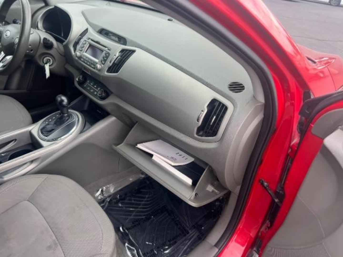 2011 Signal Red Metallic /Alpine Gray Cloth In Kia Sportage LX FWD (KNDPB3A27B7) with an 2.4L V6 DOHC 24V engine, 6-Speed Automatic transmission, located at 940 North Main Street, Cedar City, UT, 84720, (435) 628-0023, 37.692936, -113.061897 - We specialize in helping ALL people get the best financing available. No matter your credit score, good, bad or none we can get you an amazing rate. Had a bankruptcy, divorce, or repossessions? We give you the green light to get your credit back on the road. Low down and affordable payments that fit - Photo#30