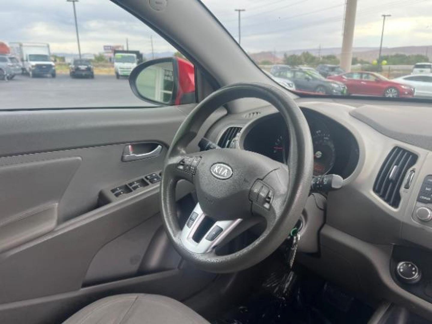 2011 Signal Red Metallic /Alpine Gray Cloth In Kia Sportage LX FWD (KNDPB3A27B7) with an 2.4L V6 DOHC 24V engine, 6-Speed Automatic transmission, located at 940 North Main Street, Cedar City, UT, 84720, (435) 628-0023, 37.692936, -113.061897 - We specialize in helping ALL people get the best financing available. No matter your credit score, good, bad or none we can get you an amazing rate. Had a bankruptcy, divorce, or repossessions? We give you the green light to get your credit back on the road. Low down and affordable payments that fit - Photo#31
