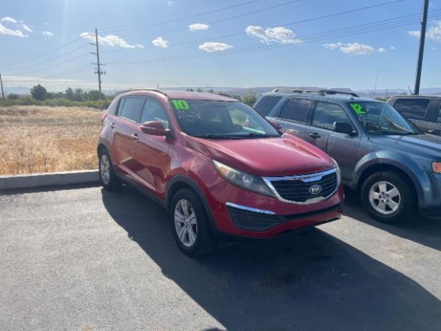 2011 Signal Red Metallic /Alpine Gray Cloth Interior Kia Sportage LX FWD (KNDPB3A27B7) with an 2.4L V6 DOHC 24V engine, 6-Speed Automatic transmission, located at 1865 East Red Hills Pkwy, St. George, 84770, (435) 628-0023, 37.120850, -113.543640 - This vehicle is a Mechanic Special. This means it will need some love. Runs a drives fine but has body damage, leaks or other mechanical issues. It did NOT pass our 50 point inspection. Get a great deal on a less than perfect car. These cars do NOT qualify for our in house financing. Cash and carry,- Photo#0