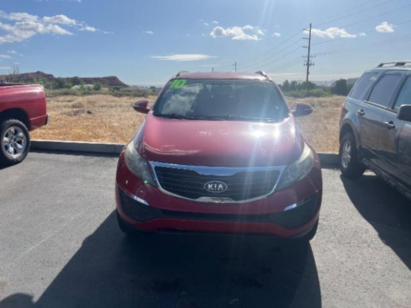 2011 Signal Red Metallic /Alpine Gray Cloth Interior Kia Sportage LX FWD (KNDPB3A27B7) with an 2.4L V6 DOHC 24V engine, 6-Speed Automatic transmission, located at 1865 East Red Hills Pkwy, St. George, 84770, (435) 628-0023, 37.120850, -113.543640 - This vehicle is a Mechanic Special. This means it will need some love. Runs a drives fine but has body damage, leaks or other mechanical issues. It did NOT pass our 50 point inspection. Get a great deal on a less than perfect car. These cars do NOT qualify for our in house financing. Cash and carry,- Photo#1